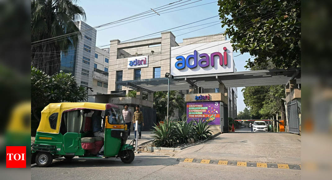 Adani stocks jump up to 20% as group issues statement – Times of India