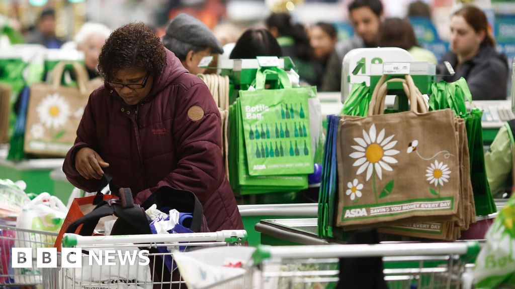 Asda says spending to cut prices will hit profits